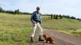 Craig Y. and Cora The Fly Fishing Pup.jpg